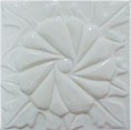 handmade ceramic tile with high relief flower design with one color glaze