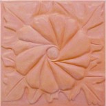 handmade terra cotta ceramic tile with a high relief flower design