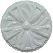 handmade ceramic tile with a high relief circular design and a one color glaze