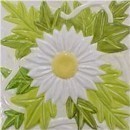 handmade ceramic tile with a high relief flower design and a multi-colored glaze