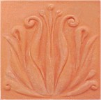 handmade terra cotta ceramic tile with a high relief flower design