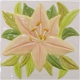 handmade ceramic tile with a high relief design and a one color glaze