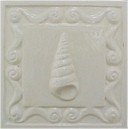 handmade ceramic tile with a high relief shell design and a one color glaze